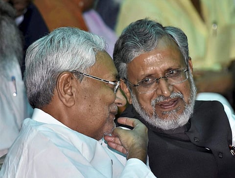 Bihar Chief Minister Nitish Kumar with Deputy Chief Minister Sushil Kumar Modi. | PTI File Photo