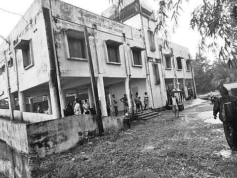 People at a cyclone shelter in Kankan village.