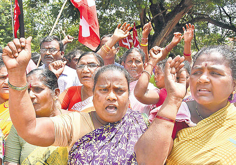 Sanitation workers take out a rally demanding cancellation of GO 279 in city on Thursday (File | EPS/ P Ravindra Babu)