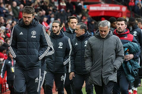 Manchester United's Michael Carrick (Extreme left) with Jose Mourinho (Second right) (Photo | Twitter/Michael Carrick)