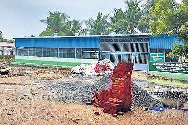 A composting unit is set up inside a burial ground, encroaching the lake