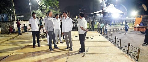 Congress leaders, including minister Krishne Byregowda, inspecting the stage in front of HAL corporate office at Minsk Square in Bengaluru on Friday | Nagaraja gadekal