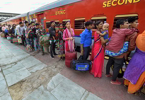 Migrant workers wait to board a train out of Gujarat in view of protests and violence breaking out over the alleged rape of a 14-month-old girl in Ahmedabad Tuesday Oct 9 2018. | (File | PTI)