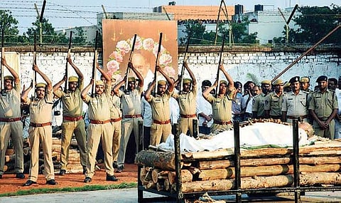 Police offer gun salute to MVVS Murthi at the funeral site near the GITAM University in Visakhapatnam on Sunday. (File Photo | EPS)