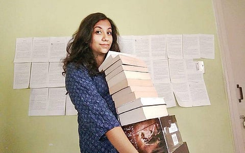 Aishwarya MR with her book collection