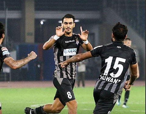 ATK's  Noussair El Maimouni celebrate his winner against Delhi Dynamos with his teammates (Photo | Twitter/ISL)
