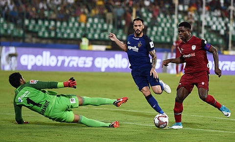 NorthEast United's Bartholomew Ogbeche (R) scores against Chennaiyin FC | PTI