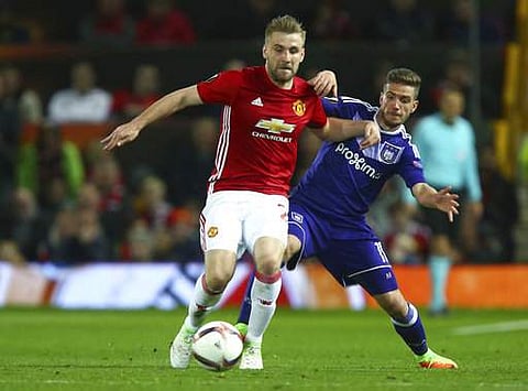 Manchester United's Luke Shaw, left, competes for the ball with Anderlecht's Alexandru Chipciu during a Europa league match. (File | AP)