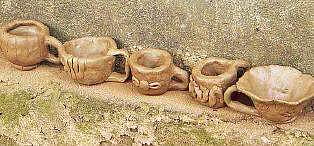 Cups made of clay laid out to dry