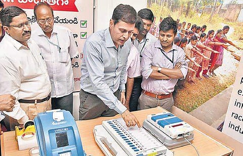 Kumar inaugurates an election awareness centre at Rangareddy Collectorate, in Hyderabad on Monday. | R Satish Babu