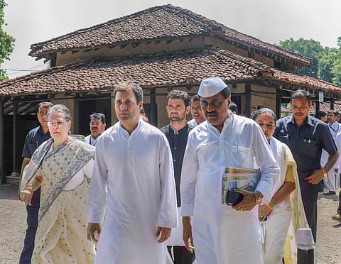 Congress President Rahul Gandhi with former Congress president Sonia Gandhi and others at Sevagram Ashram in Wardha. (Photo| PTI)
