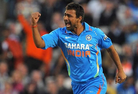 India's Praveen Kumar celebrates after taking the wicket of England's Alex Hales for 0 during the 20-20 cricket match between England and India at Old Trafford cricket ground in Manchester, north-west England on August 31 2011. (File Photo | AFP)