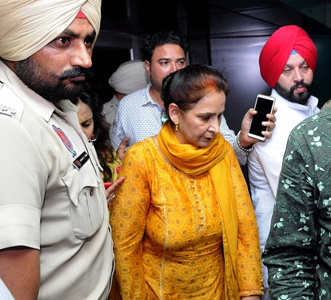Navjot Kaur Sidhu, wife of Punjab minister of Tourism Cultural Affairs, comes out of a hospital after enquiring about the well being of train accident victims in Amritsar. (PTI)