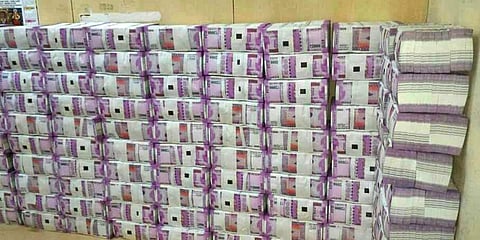 Image of Rs 2000 note bundles used for representation purpose.