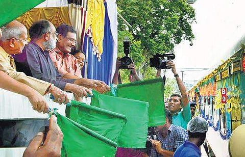 Union Minister of State for Culture and Tourism Alphons Kannanthanam flagging off the Kochuveli-Banaswadi Humsafar Express at Kochuveli railway station on Saturday. A Sampath MP and O Rajagopal MLA are also seen | Express