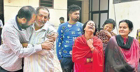 Relatives of victims of the train accident break down at the Civil Hospital in Amritsar on Saturday | PTI