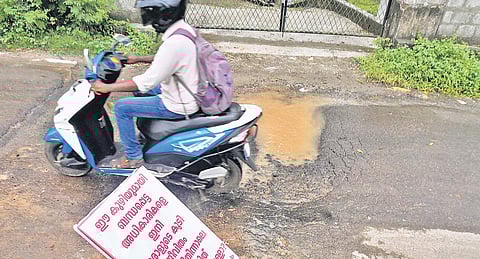 The number of accidents of motorists in the city, due to the pathetic condition of the roads, is on the rise. To avert accidents, the public has placed a flex board, in a huge pothole along the N H Bypass near Maradu | Albin Mathew