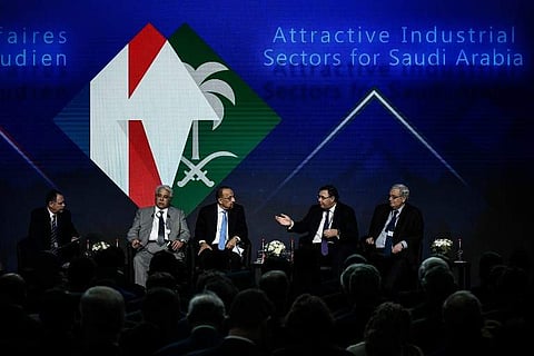 (L-R) Panel moderator Eric Chaney of the Institut Montaigne, Saudi Arabia's Minister of Commerce and Investment Dr Majed Al-Qasabi, Saudi Arabia's Minister of Energy, Industry and Mineral Resources Khalid Al-Falih, CEO of French oil giant Total Patrick Po