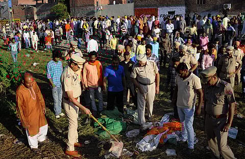 Amritsar Local people gather at the scene of the accident along train tracks in Amritsar Saturday October 20 2018. (File | PTI)