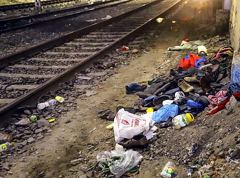 Footwears lie along the railway tracks at Santragachi Station where a stampede took place in Howrah district of West Bengal Tuesday October 23 2018. | PTI