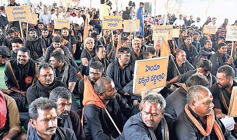 Ayyappa devotees stage a protest in Vijayawada on Wednesday against the Supreme Court judgement allowing women between 10 and 50 years into Ayyappa temple in Sabarimala | R V K Rao
