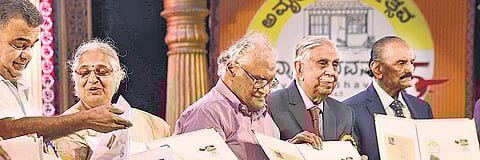 Founder of Maiyas, Sadananda Maiyas, Infosys Foundation chairperson Sudha Murty,  Prof C N R Rao, Justice M N Venkatachalaiah and poet Nissar Ahmed release stamps | Vinod Kumar T