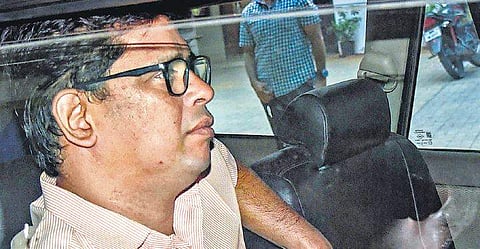 Activist Arun Ferreira being arrested from his residence in Thane on Friday | PTI