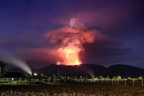 This picture taken from Kawangkoan in Minahasa, North Sulawesi on February 7, 2016 shows Mount Soputan spewing hot lava as the mountain erupts. Mount Soputan on Sulawesi is one of the island's most active volcanoes. (Photo | AP)