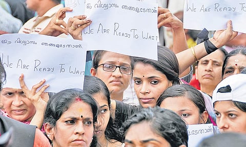 Women devotees staging a protest in front of  Hanuman Swamy Temple at PMG Junction in Thiruvananthapuram against  the Supreme Court decision allowing women’s entry to Sabarimala | B P Deepu