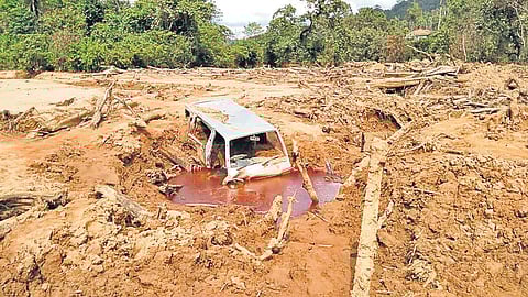 File picture of a car stuck in one of the landslide-hit areas in Kodagu | Express