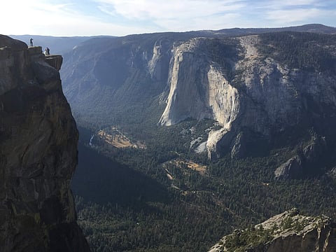 FILE - In this Thursday, Sept. 27, 2018 file photo, an unidentified couple gets married at Taft Point in California's Yosemite National Park. (Photo | AP)