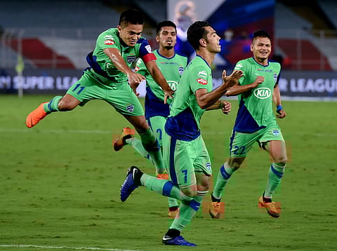 Miku of Bengaluru FC celebrates with captain Sunil Chhetri and other teammates after scoring a goal against ATK | PTI