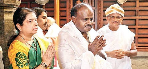 Karnataka CM H D Kumaraswamy, his wife Anitha Kumaraswamy and  Dharmadhikari Veerendra Heggade in Dharmasthala (File Photo| EPS)
