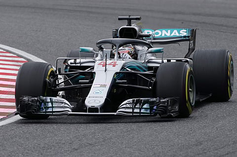 Mercedes driver Lewis Hamilton of Britain steers his car during the second practice session for the Japanese Formula One Grand Prix at the Suzuka Circuit in Suzuka, central Japan, Friday, Oct. 5, 2018. | AP