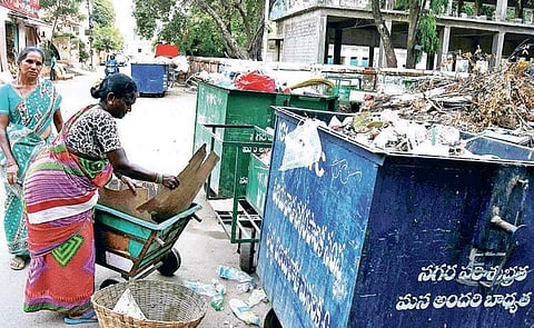 Only a few sanitation workers left to clear garbage in Vijayawada on Friday | P Ravindra Babu