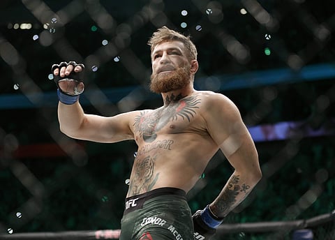 Irishman Conor McGregor walks in the cage before fighting Russia's Khabib Nurmagomedov in a lightweight title mixed martial arts bout at UFC 229 in Las Vegas. (Photo | AP)