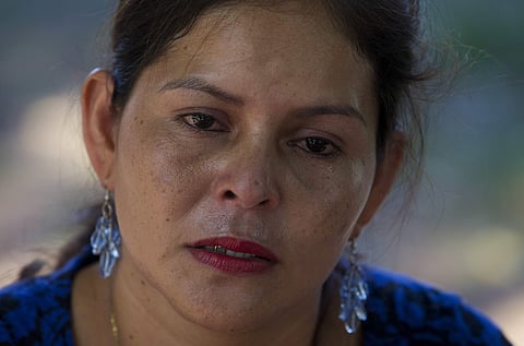 Araceli Ramos sheds a tear as she describes her battle to be reunited with her 5-year-old daughter, Alexa, during an interview in a park in San Miguel, El Salvador, on Aug. 18, 2018. In Ramos' darkest days, she would lay on her bed, stare at the ceiling a