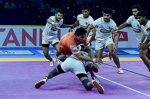 Players of Haryana Steelers in White and Puneri Paltan in Orange in action during their match of Vivo Pro Kabaddi league season6 at Jawaharlal Nehru Indoor Stadium in Chennai on Monday October 8 2018. | PTI