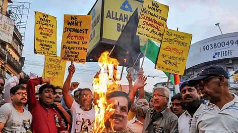 Various organisations have took to the streets over the last few days to protest the killing of five Bengalis in Assam’s Tinsukia. (Photo | PTI)