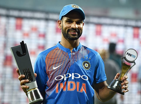 India's Shikhar Dhawan poses with the Man of the Match trophy after his team's win in the third and last Twenty20 international cricket match against West Indies in Chennai. (Photo | PTI)