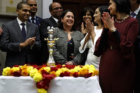 Neomi Rao, Administrator of the Office of Information and Regulatory Affairs, smiles as President Donald Trump announces his intention to nominate her to fill Brett Kavanaugh's seat on the U.S. Court of Appeals for the D.C. Circuit, during a Diwali ceremo