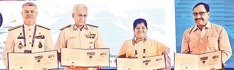 Release of special postal cover during the 10th IONS anniversary seminar in Kochi. (From left) Iran Navy Commander Rear Admiral Hossein Khanzadi, Chief of Naval Staff Admiral Sunil Lanba, Fisheries Minister J Mercykutty Amma and northern region Post Maste