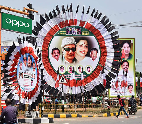 AIADMK party flag and party's former and present leaders huge cut outs, flex boards were kept around the city on the mark of MGR Centenary celebration. (File | EPS)