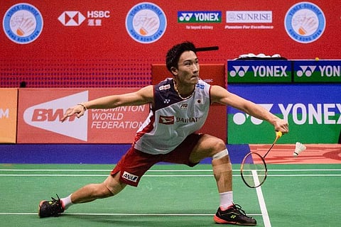 Kento Momota of Japan hits a return against South Korea's Son Wan-ho in their men's singles semi-final match at the Hong Kong Open badminton tournament. (Photo | AFP)