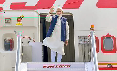 Prime Minister Narendra Modi waves as he emplanes for Maldives to attend the historic swearing-in ceremony of President-elect Ibrahim Mohamed Solih. (Photo | PTI)