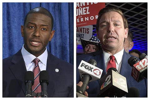 This combination of November 2018 photo shows Andrew Gillum, left, the Democratic candidate for governor, and Republican candidate Ron DeSantis. On Saturday, Nov. 17, 2018, Gillum ended his hard-fought campaign, just hours before counties must turn in the