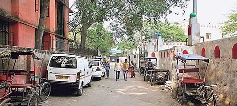 The stretch leading to TD Dhariyal’s office in Old Delhi is lined with vehicles and tricycles through the day | SHEKHAR YADAV