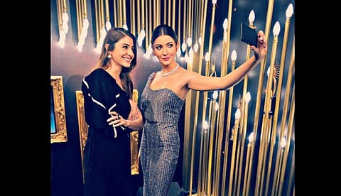 Anushka Sharma poses with her wax figure in Madame Tussauds (Photo | Twitter @anushkasharma)