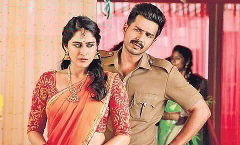 A still of Vishnu Vishal and Regina Cassandra in Silukkuvarapatti Singam.