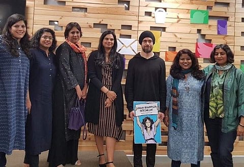 Twitter CEO Jack Dorsey, amidst six women journalists, holds a placard saying 'Smash Brahminical Patriarchy' which was gifted to him by a Dalit activist. (Photo | Anna MM Vetticad/ Twitter)